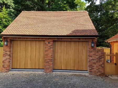 Penchard Timber twin up and over garage doors